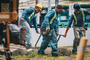Team of construction workers collaborating on a project in San José, Costa Rica.