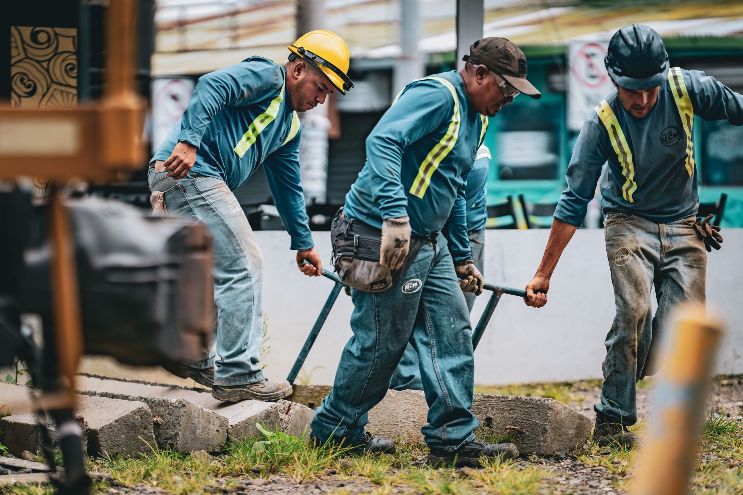 Team of construction workers collaborating on a project in San José, Costa Rica.